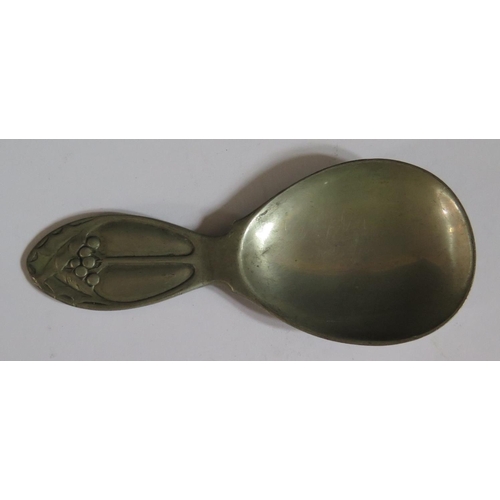 351 - A Liberty TUDRIC Pewter Caddy Spoon decorated with holly and berries, model 01244, 10cm long