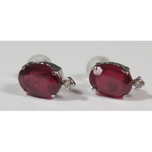 403 - A Pair of 18K White Gold, Ruby and Diamond Earrings, 1.6g, ruby 8x6mm