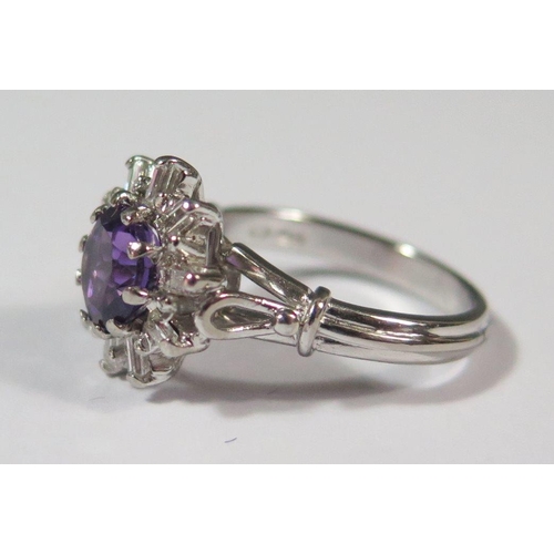 406 - An 18ct White Gold, Amethyst and Baguette Cut Diamond Dress Ring, size L, 6.2g, head of ring 17mm, a... 