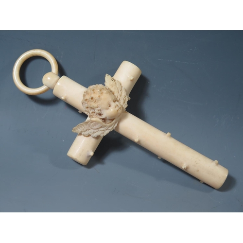 407 - A 19th Century Carved Ivory Cross decorated with cherub, 13x6cm **UK BIDDING ONLY**