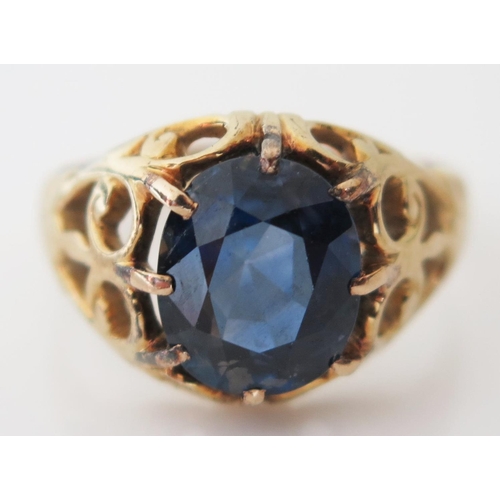 414 - An 18ct Yellow Gold and Sapphire Ring, size M, 4.4g, stone 10x8mm