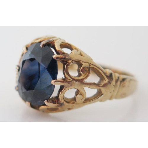 414 - An 18ct Yellow Gold and Sapphire Ring, size M, 4.4g, stone 10x8mm