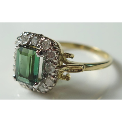 417 - A Modern 18ct Yellow Gold, Emerald and Diamond Ring, size P.5, 4.4g, EEW 1.75ct