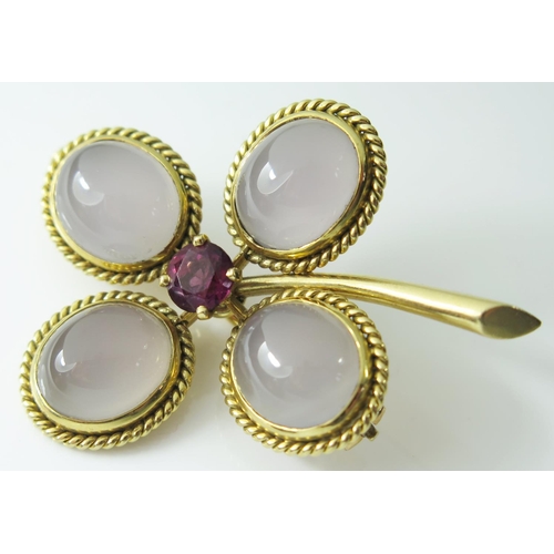 419 - A French 18ct Gold, Moonstone and Ruby Flower Head Brooch, 20.3g, 50mm high, ruby 7mm diam., eagle h... 