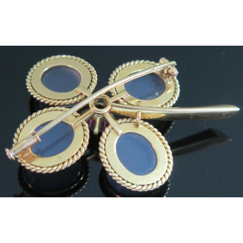 419 - A French 18ct Gold, Moonstone and Ruby Flower Head Brooch, 20.3g, 50mm high, ruby 7mm diam., eagle h... 