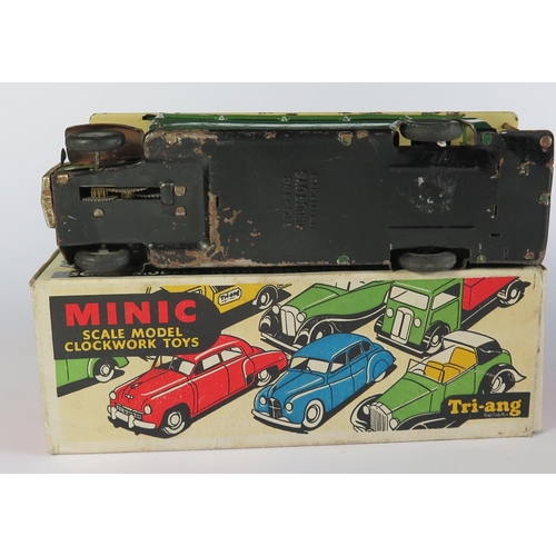 42 - A Triang Minic Clockwork 52M Single Deck Bus in green and dark green. Working Motor in good complete... 