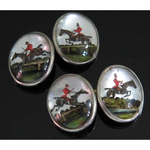 421 - A Pair of 14ct Gold Sussex Crystal Cufflinks decorated with four scenes of a hunter with rider jumpi... 