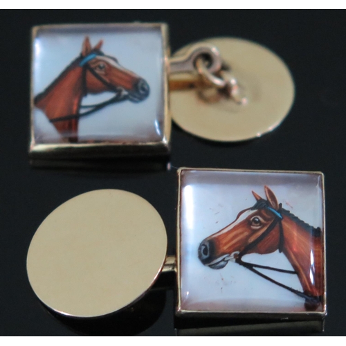 422 - A Pair of 14K Yellow Gold Sussex Crystal Cufflinks decorated with two horses heads, 14mm sq. 10.3g