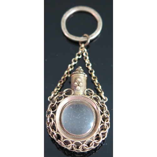 423 - A Georgian Miniature Unmarked Gold 'Scent Bottle' Locket on chain with hinged crystal centre and top... 