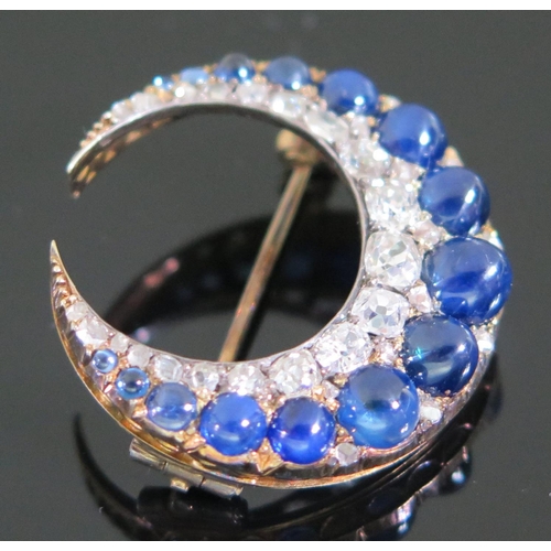 454 - A Victorian Cabochon Sapphire and Old Cut Diamond Crescent Brooch, 5.2g, 27mm diam., probably Ceylon... 