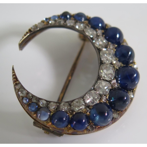 454 - A Victorian Cabochon Sapphire and Old Cut Diamond Crescent Brooch, 5.2g, 27mm diam., probably Ceylon... 