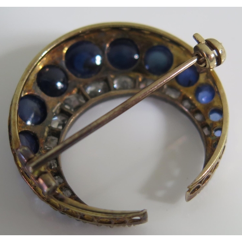 454 - A Victorian Cabochon Sapphire and Old Cut Diamond Crescent Brooch, 5.2g, 27mm diam., probably Ceylon... 