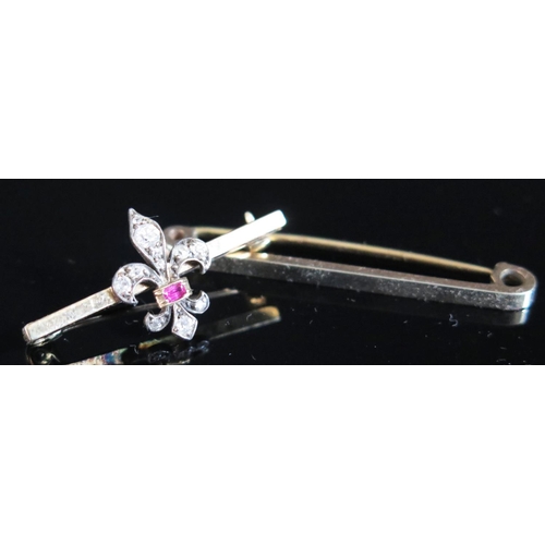 479B - A Cased 9ct Gold Bar Brooch (2.7g) and a ruby and diamond Fleur de Lis brooch (2.8g)