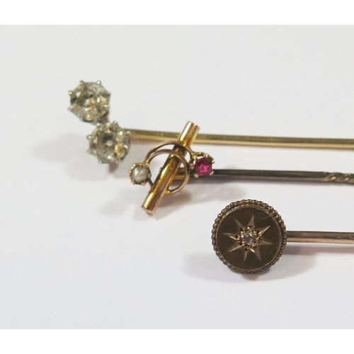 480 - A 15ct Diamond Pin (1.7g), unmarked twin diamond pin and diamond and ruby pin (mark rubbed), 3g