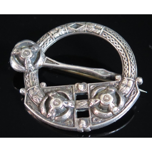 481b - An Irish White Metal Celtic Brooch, the back marked West & Son College Green Dublin Registered Decr.... 