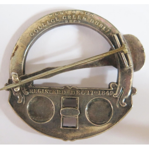 481b - An Irish White Metal Celtic Brooch, the back marked West & Son College Green Dublin Registered Decr.... 