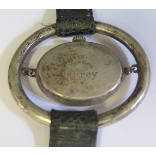 528 - An Obrey Silver Cased Wristwatch, running