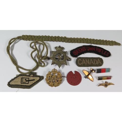 557 - R.A.F. Sweetheart Brooch and cap badge, Devonshire Regiment (THE HAYTOR) cap badge, etc.