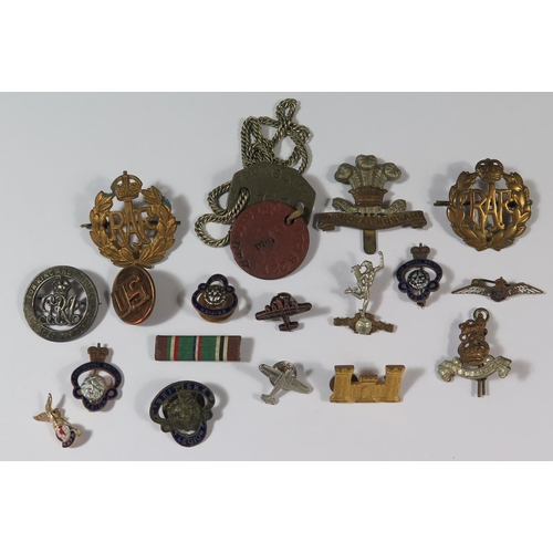 558 - A Selection Military Cap Badges including 10th Royal Hussars, R.A.F. cap badges and Portsmouth dog t... 