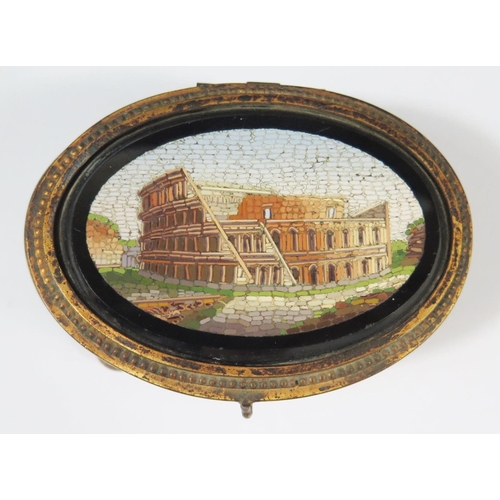 562 - A 19th Century Micomosaic Oval Casket decorated with scene of the Colosseum, 10x7cm. Base missing