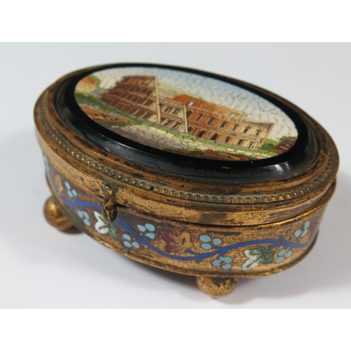 562 - A 19th Century Micomosaic Oval Casket decorated with scene of the Colosseum, 10x7cm. Base missing