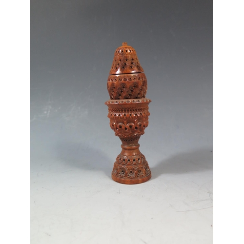 564 - A 19th Century Carved Coquilla Nut Egg Cup 85mm and pear shaped box with screw top 65mm