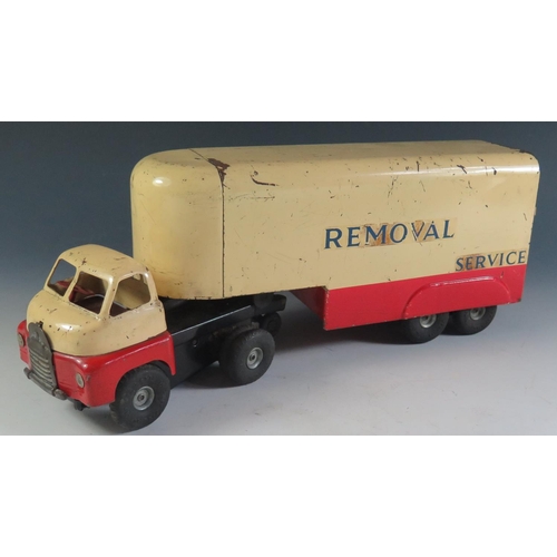 59 - A Triang Minic Tinplate Bedford Removals Lorry with Push n' Go Motor (36cm approx).