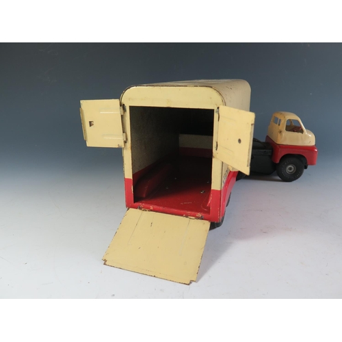 59 - A Triang Minic Tinplate Bedford Removals Lorry with Push n' Go Motor (36cm approx).