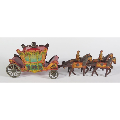 66 - A Wells Brimtoy Tinplate 1937 Coronation Coach (23cm approx).