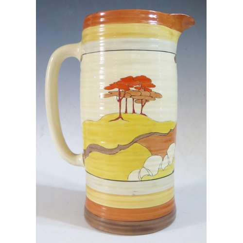 662 - A Rare Clarice Cliff Bizarre Lynton Jug decorated in the Coral Firs pattern, 28.5cm, 1933-39. Slight... 