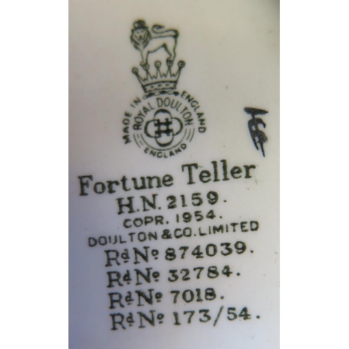 675 - A Royal Doulton Figurine Fortune Teller HN2159