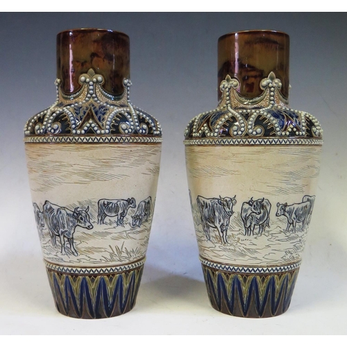 682 - A Pair of Hannah Barlow Doulton Burslem Vases decorated with cattle, incised initials to base 27.5cm... 