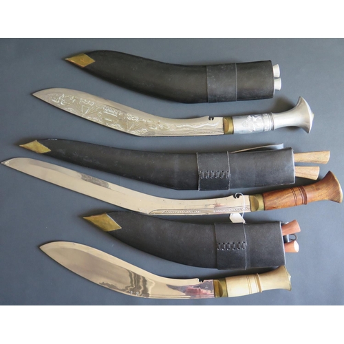 700 - A Large Ornamental Kukri, 80cm overall length and two others