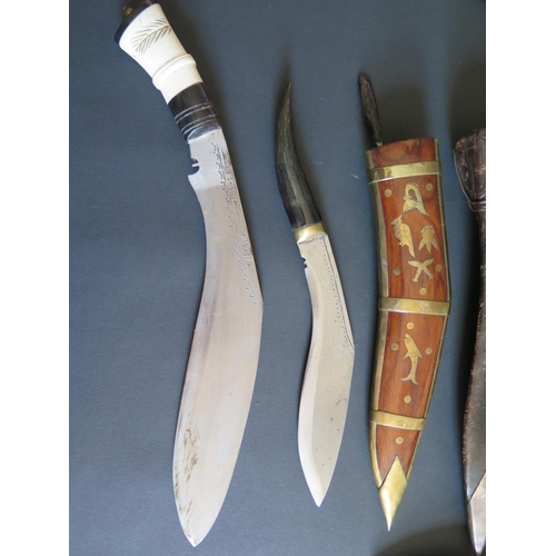 701 - Seven Kukri, largest 47cm including scabbard