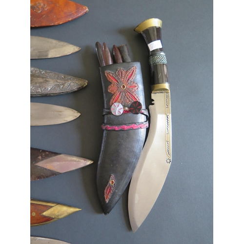 701 - Seven Kukri, largest 47cm including scabbard