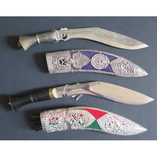 702 - A Modern Kukri with white metal mounted scabbard, 40cm overall length and one other