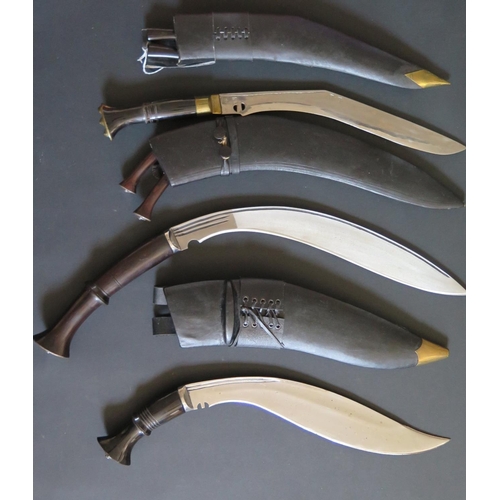 709 - Three Ornamental Kukri, largest 61cm overall length