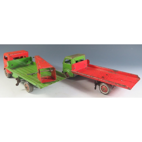 75 - Two Mettoy Clockwork Tinplate Low Loader and Crane Truck, motors work