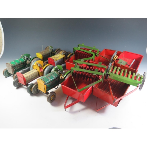 77 - A Collection of Mettoy Clockwork Tinplate Tractors, trailers and farm equipment