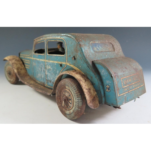 80 - A Large Scale Mettoy Clockwork Tinplate Car in blue and cream in poor condition and motor does not w... 