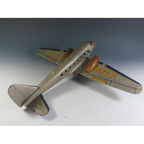 82 - A Scarce Mettoy Clockwork Tinplate Airliner Series, circa 1935 (52cm approx wingspan). DC3 Airliner ... 