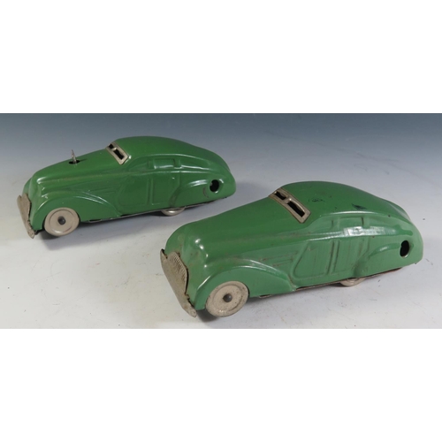 83 - Two Chad Valley Clockwork Tinplate Cars Variations, both motors work (13.5cm approx).