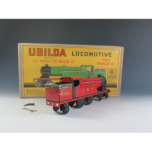 85a - A Chad Valley Ubuilda Clockwork Train in Red 