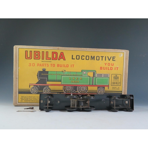 85a - A Chad Valley Ubuilda Clockwork Train in Red 