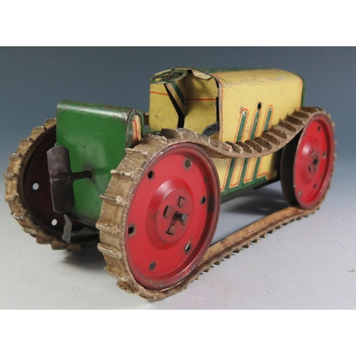 87 - A Scarce German Made Essdee Clockwork Tinplate Tractor with caterpillar tracks in cream, green and r... 