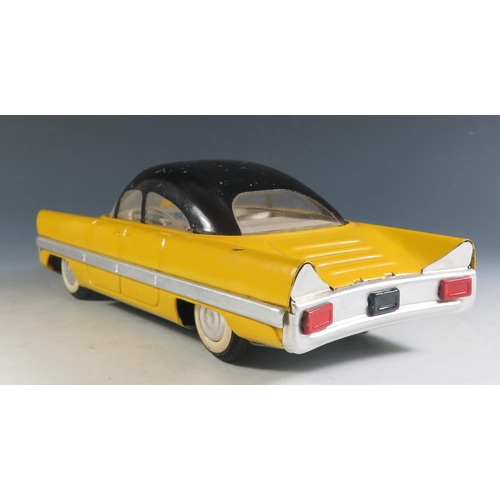 96 - A Tinplate Car, possibly Gaz Volga and Russian made? Yellow and black (27.5cm approx).