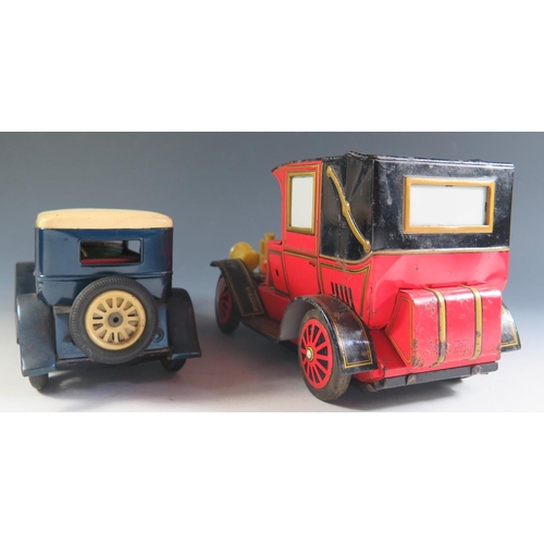 99 - A Yonezawa Japanese Tinplate Limousine in Blue and Cream (25cm approx) and An Alps Battery Operated ... 