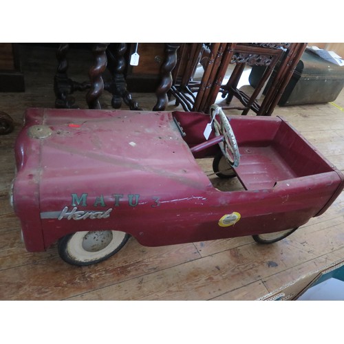 196A - A Pedal Car (possibly Triang) in worn condition. 93cm approximately.