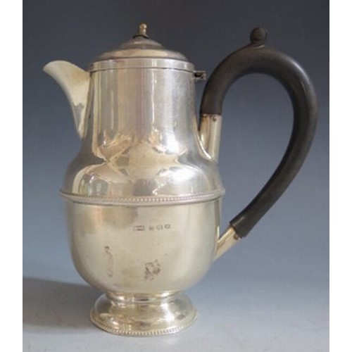 356B - A George V Silver Hot Water Pot, Birmingham 1931, A L Davenport Ltd., 314g, 16.5cm to handle. Finial... 