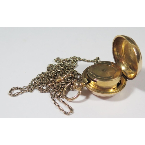 513b - A 9ct Gold Filled Sovereign Case with chased foliate scroll decoration and on an unmarked yellow met... 